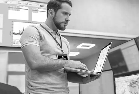 Researcher holding laptop